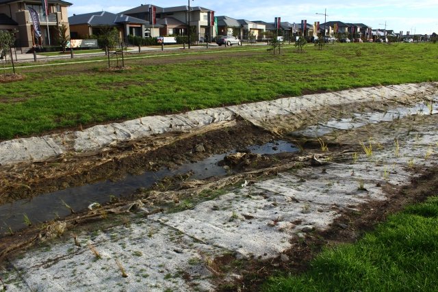 constructed waterway near St Georges Rd southside Donnybrook Rd with rilling